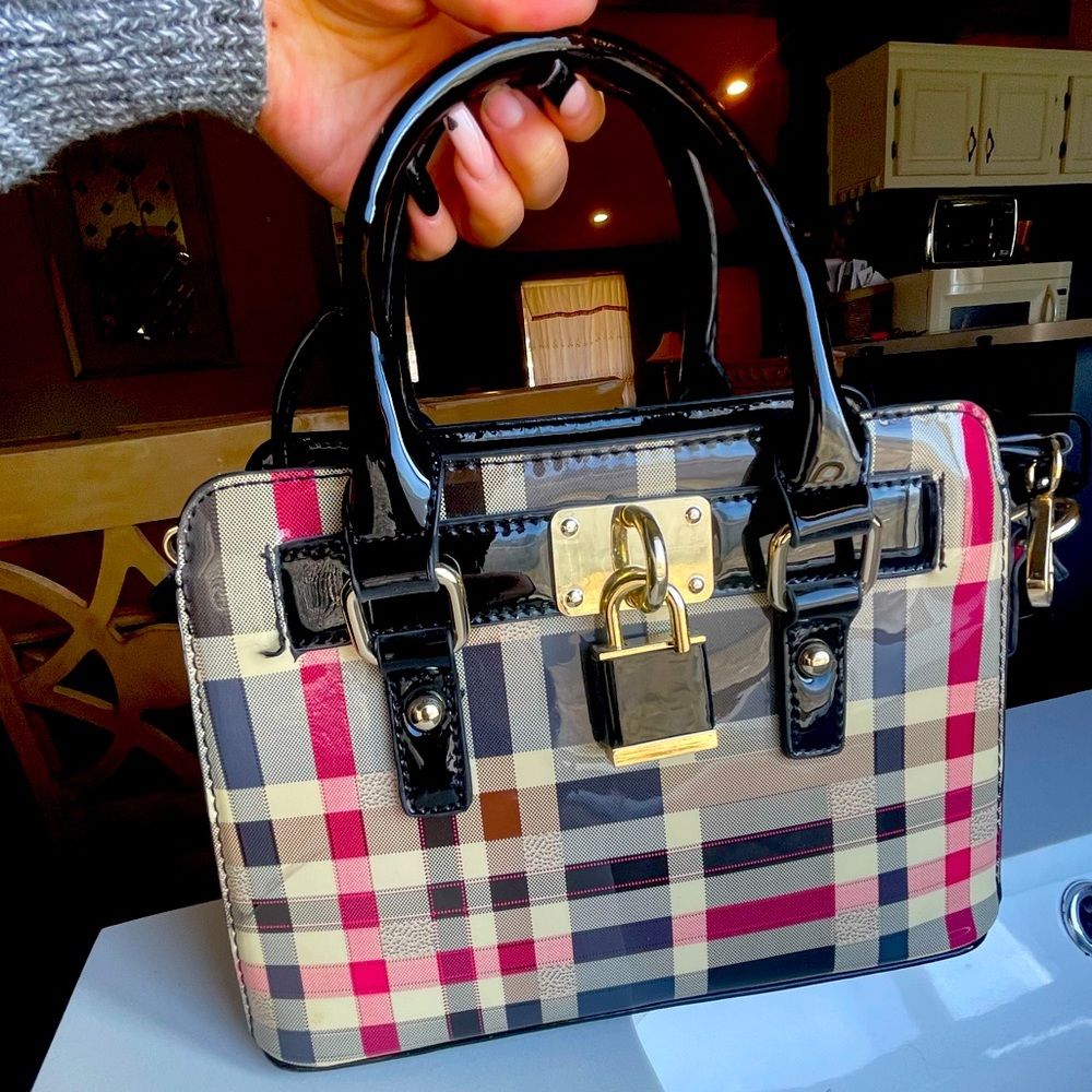 Made in China handbag with a detachable satchel in perfect condition with lock